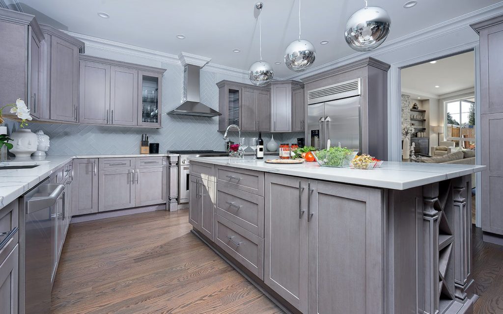 Grey shaker cabinets with white countertop