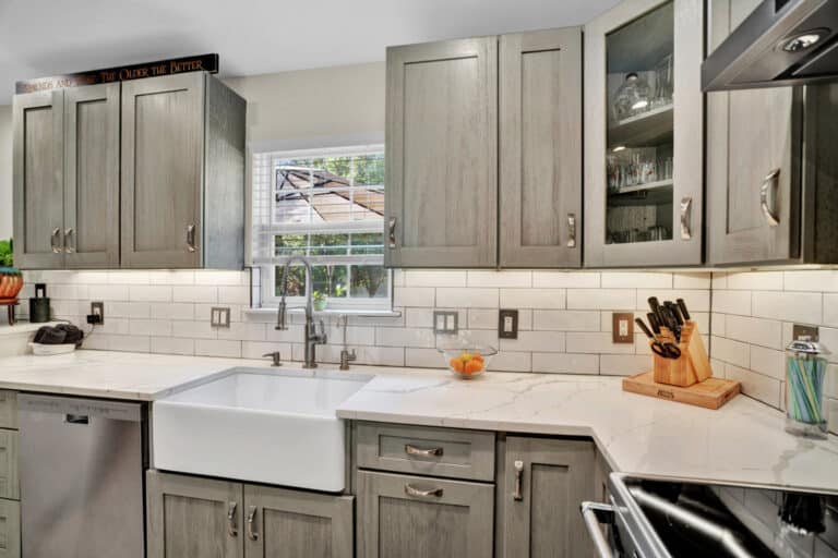 Farmhouse style kitchen project in Stafford VA with gray shaker cabinets, white countertops