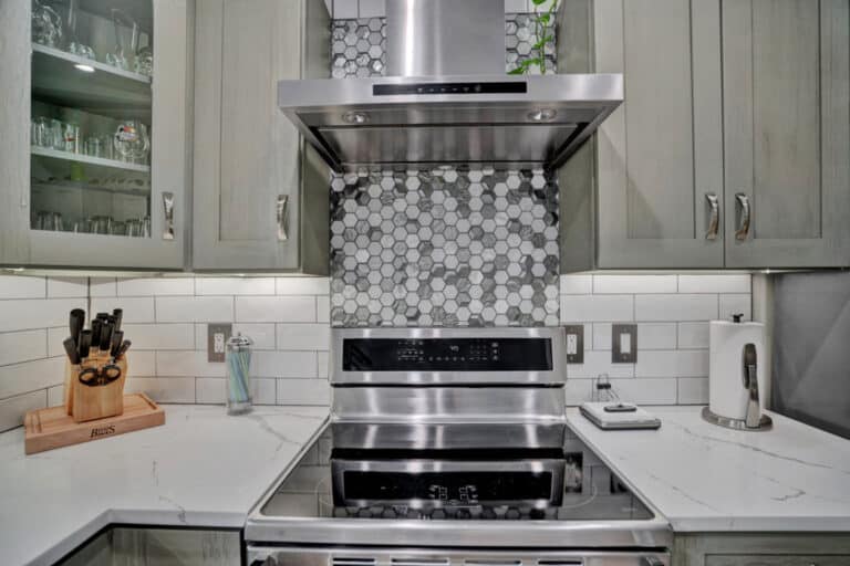 Gray shaker cabinets with glass door