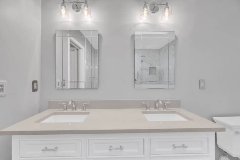 Spacious light gray bathroom project in Fredericksburg va with white vanity