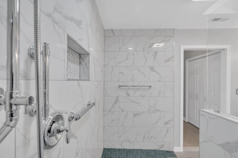 Spacious light gray bathroom project in Fredericksburg va with white vanity, and toilet