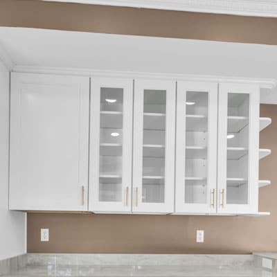 White wall cabinets with glass door