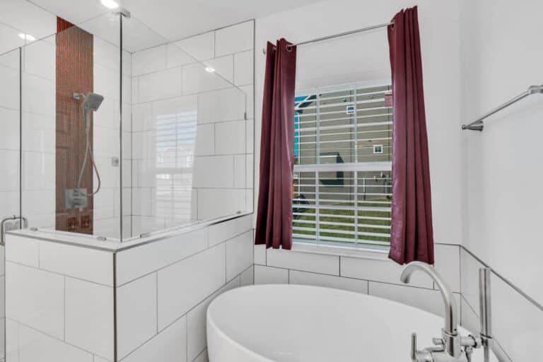 Bathroom with tub and shower