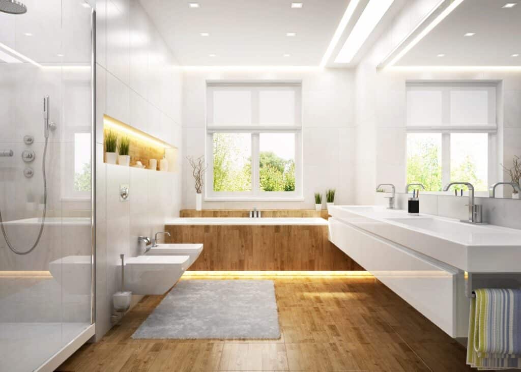 Modern style bathroom with floating toilet, tub and vanity