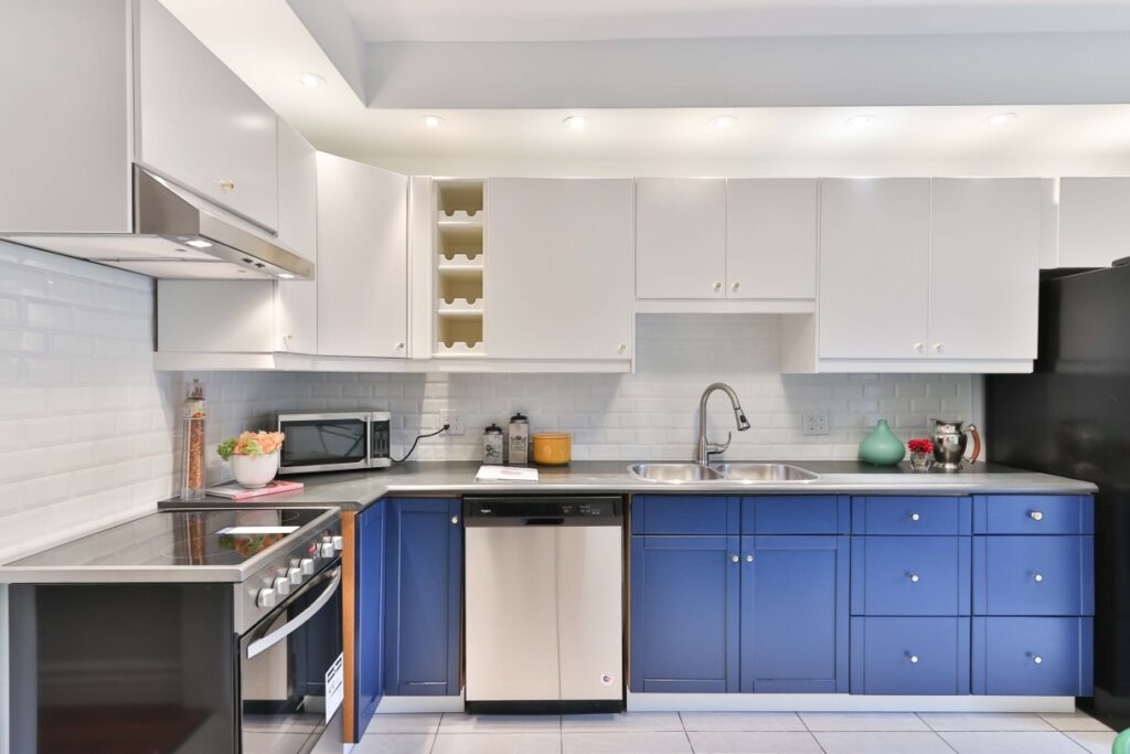 Kitchen with white and blue cabinets