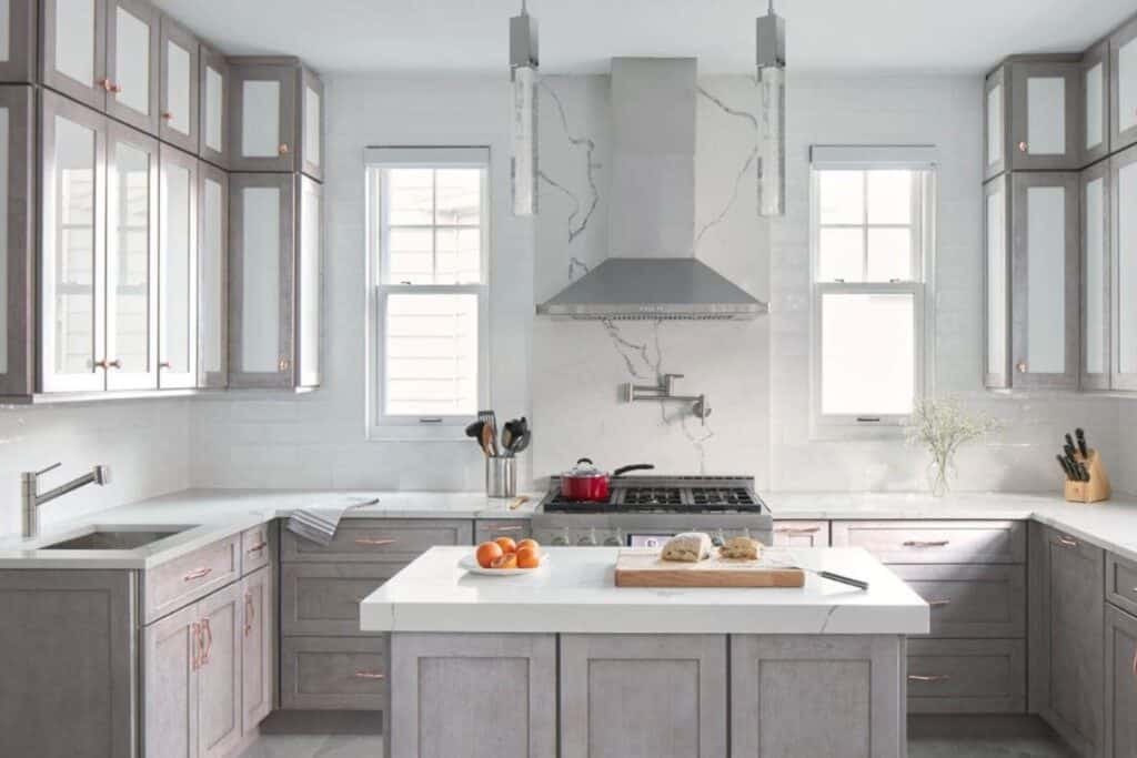 Grey shaker cabinets with white countertops
