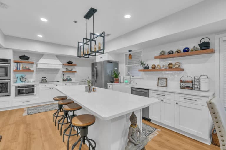 kitchen project in waldorf with wood flooring, white countertop and cabinets