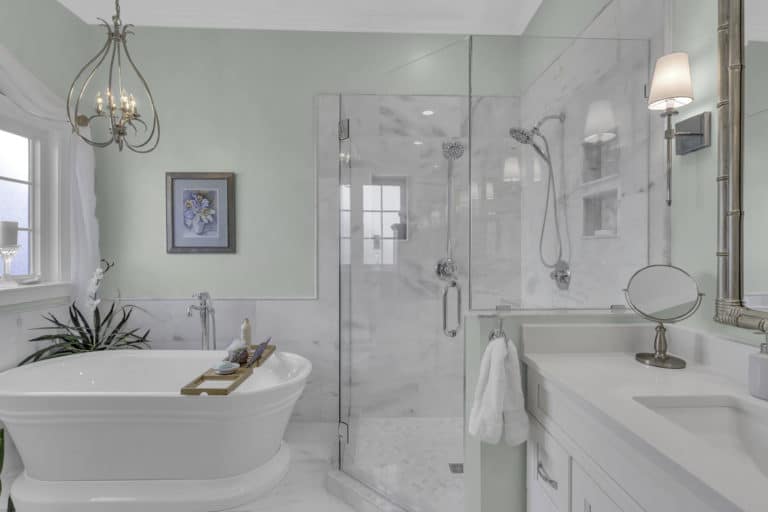 Elegant bathroom with tub, shower and vanity