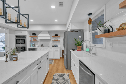 White kitchen with white shaker cabinets and countertop