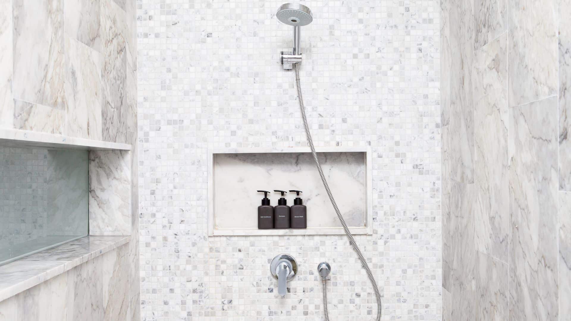 White shower with niche