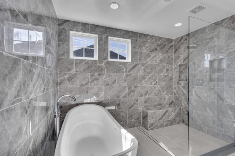 Luxurious bathroom with tub and shower