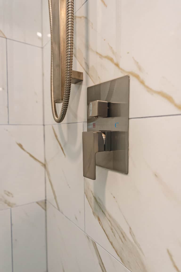 Shower with silver hardware