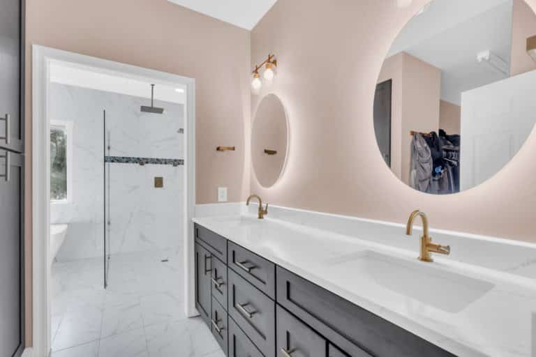 Elegant double sink brown vanity with round mirrors