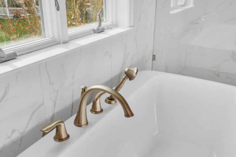 Gold hardware on tub