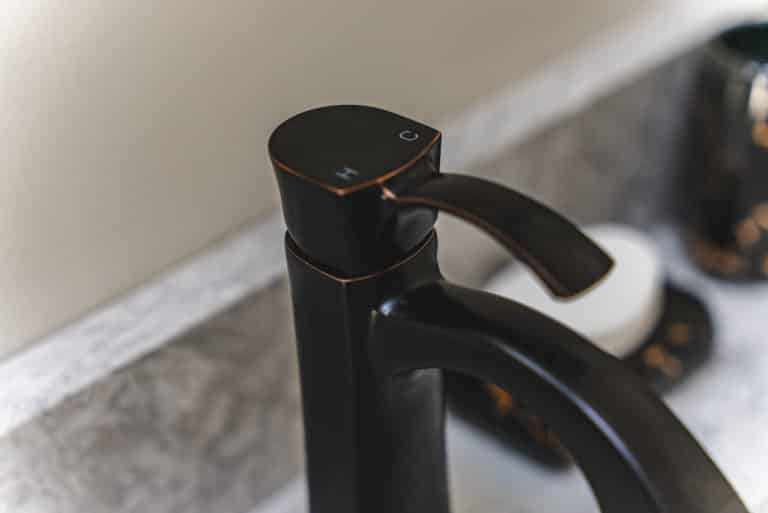 Zoomed in black faucet