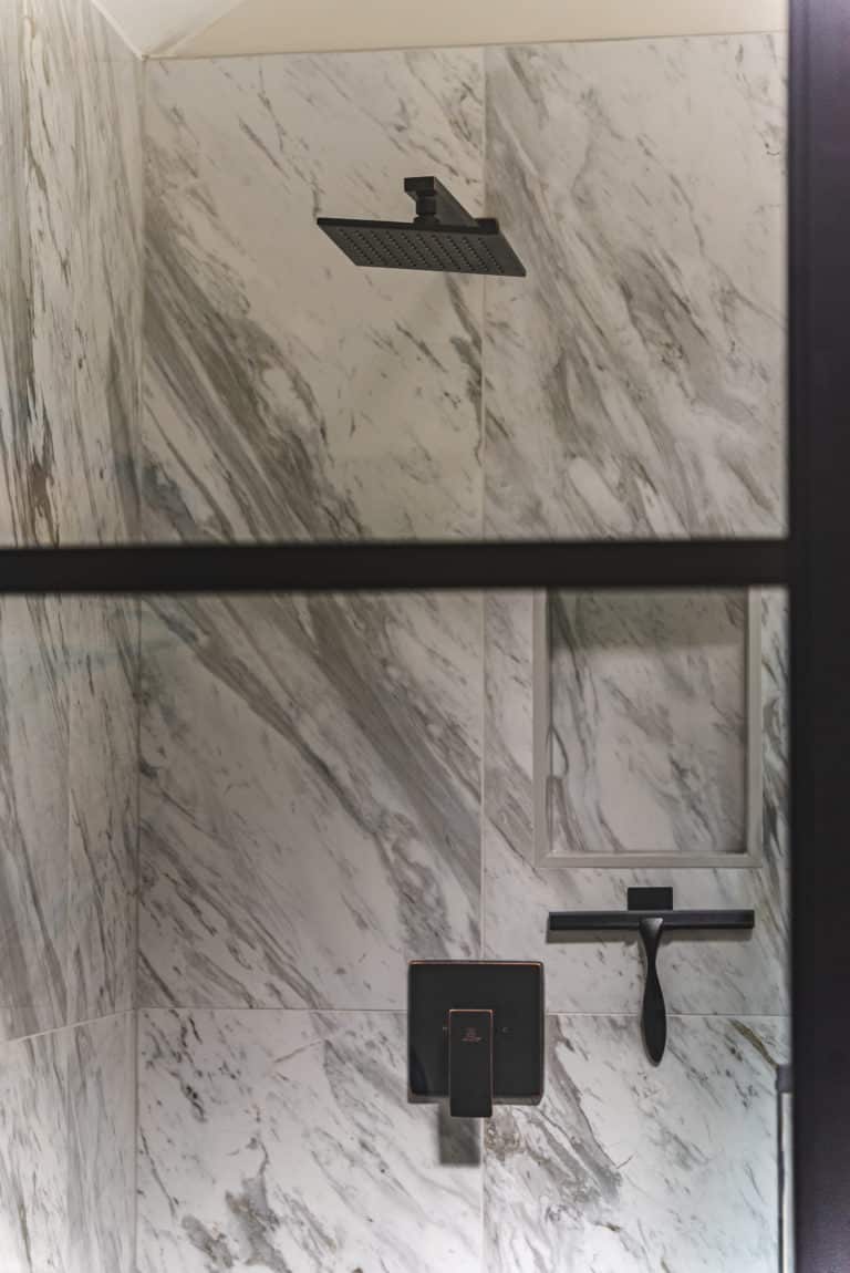 Shower with tiles surround, with glass door