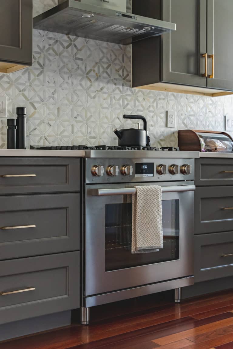 Elegant kitchen with grey shaker cabinets