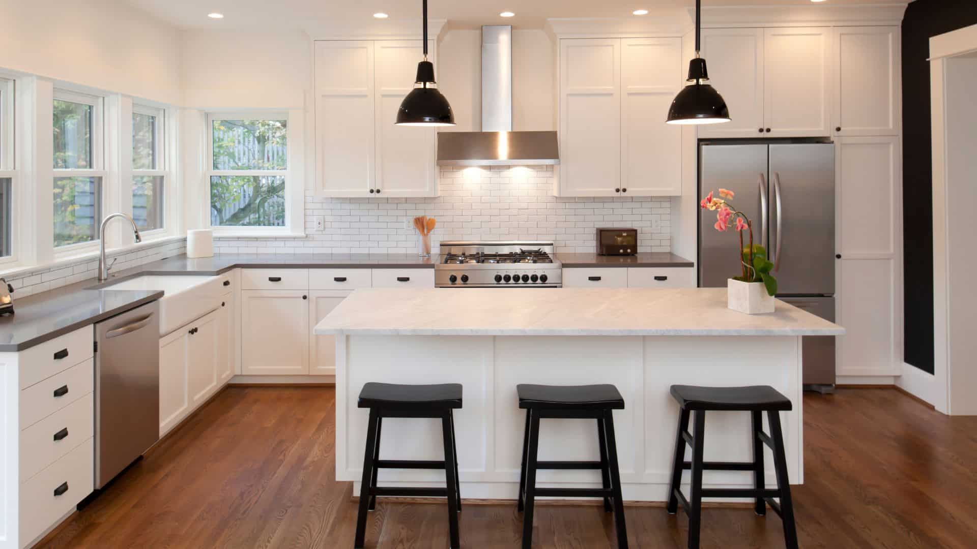 L Type kitchen with white shaker cabinets