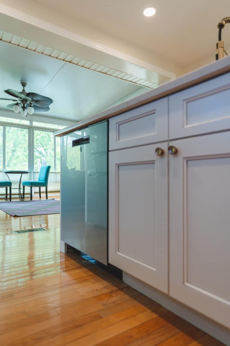 Elegant kitchen with white countertop and white cabinets