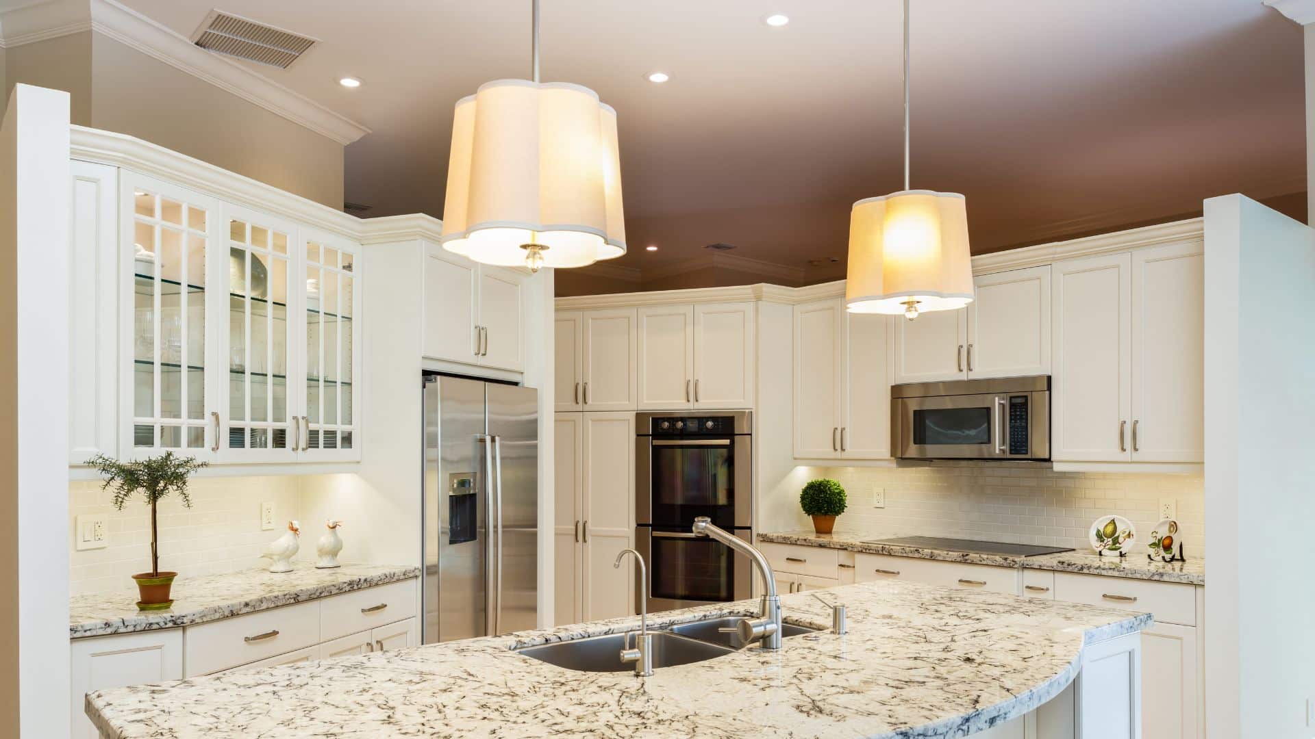 Elegant white kitchen with shaker cabinets