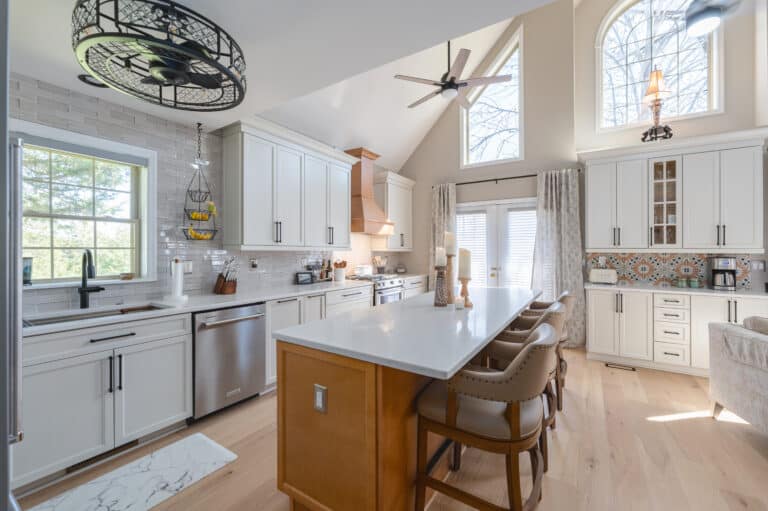 White countertop on kitchen island with brown base cabinet