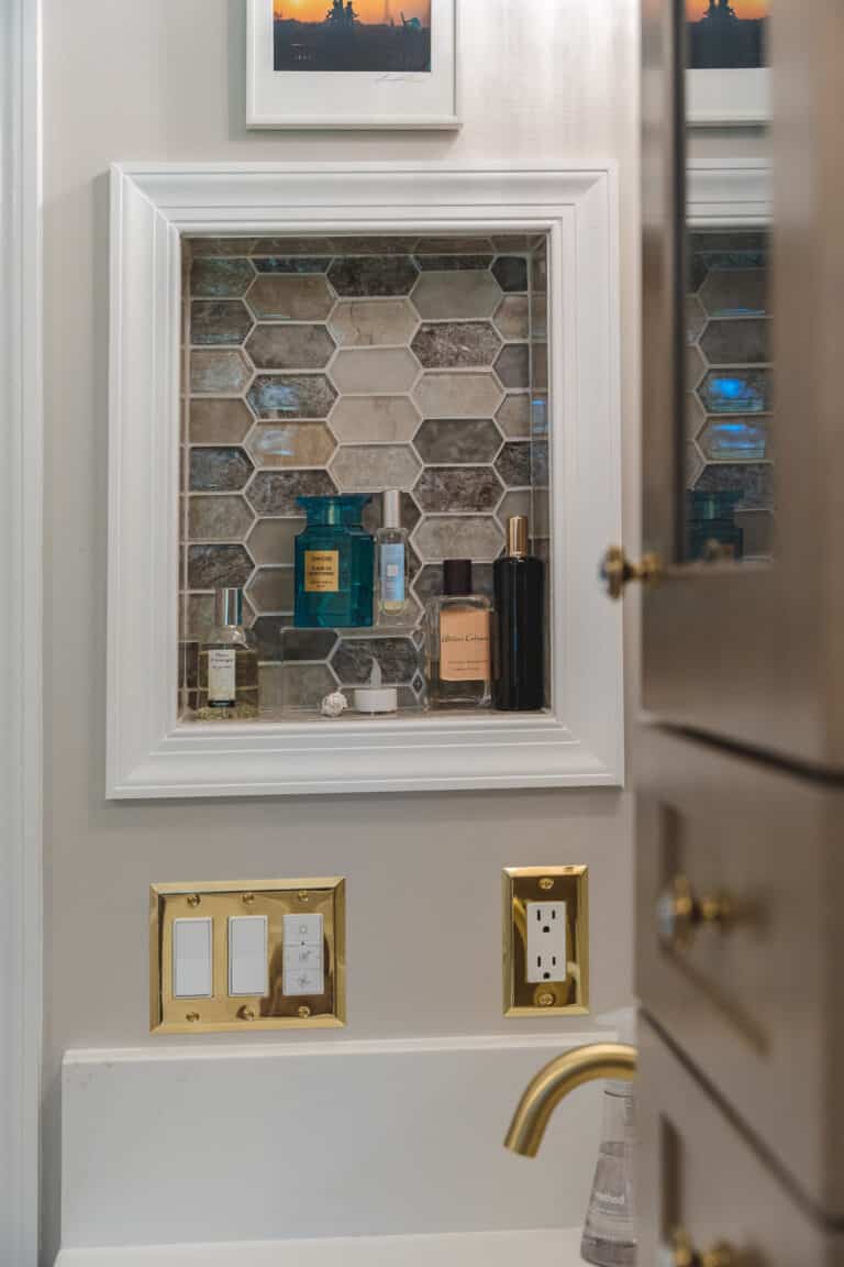 Elegant bathroom with brown cabinets, toilet, and tub