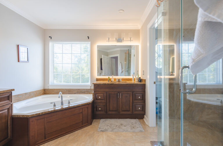 Bathroom Remodel In Nokesville, VA brown cabinets, and tub