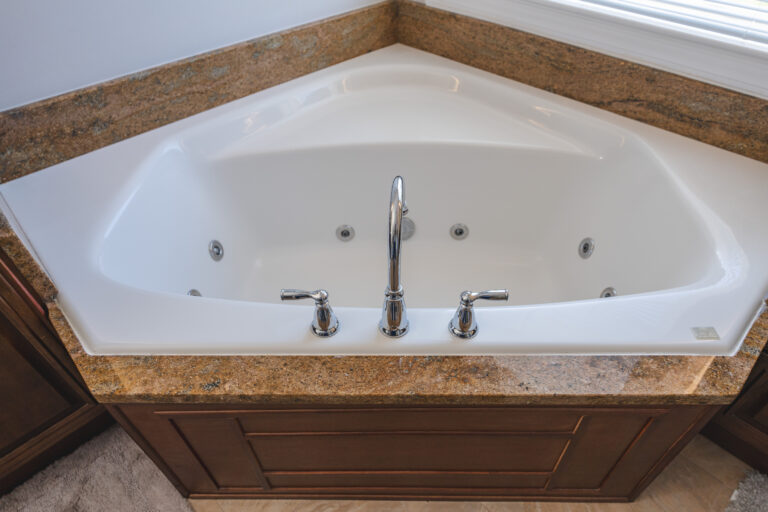 Silver faucet on countertop