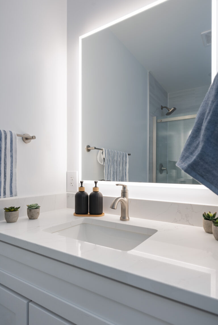 White countertop, shaker vanity