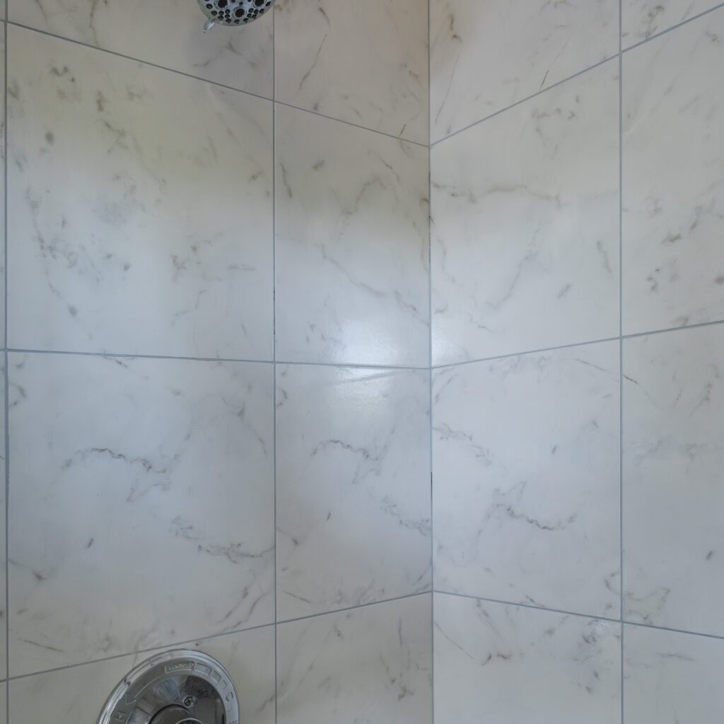 White wall tiles on bathroom