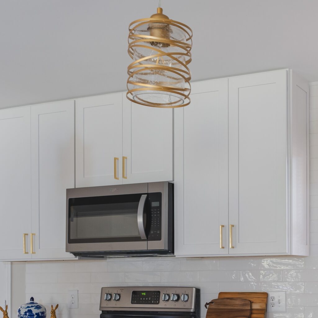 White cabinets with gold handles