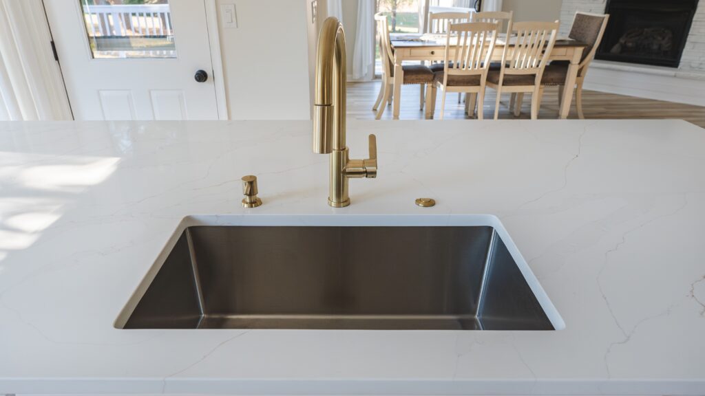 Faucet and sink in kitchen island