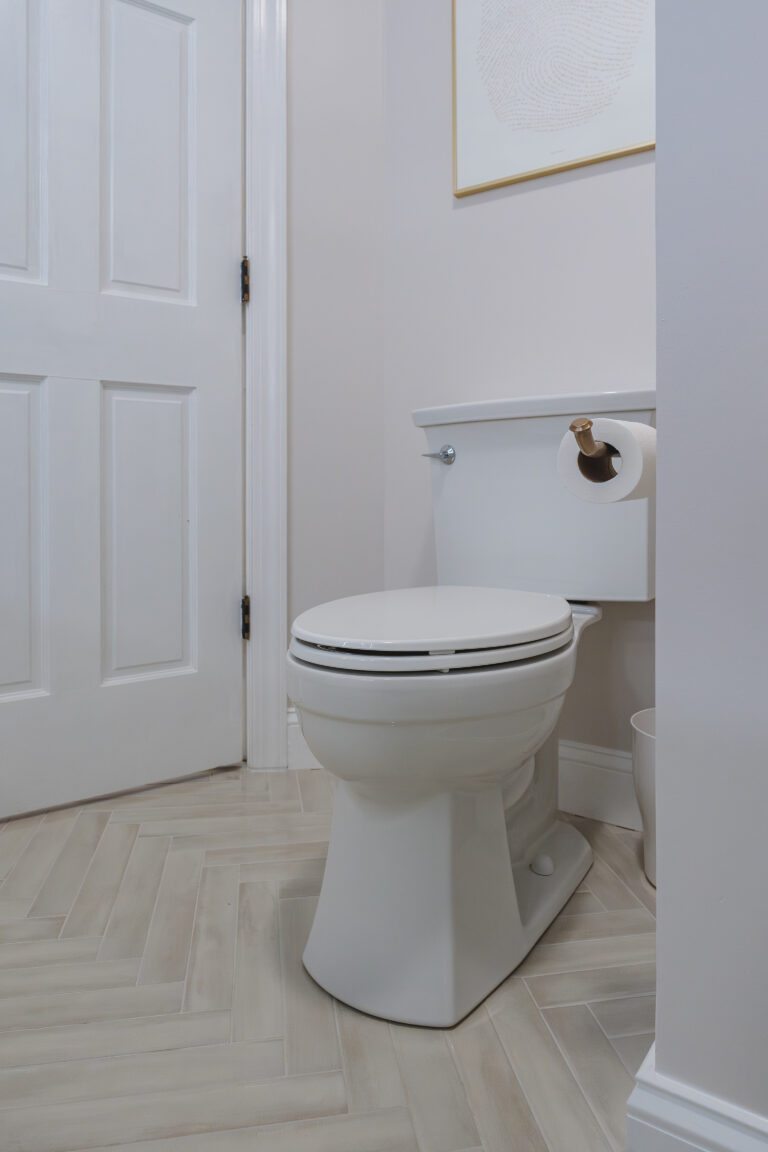 Toilet with white door