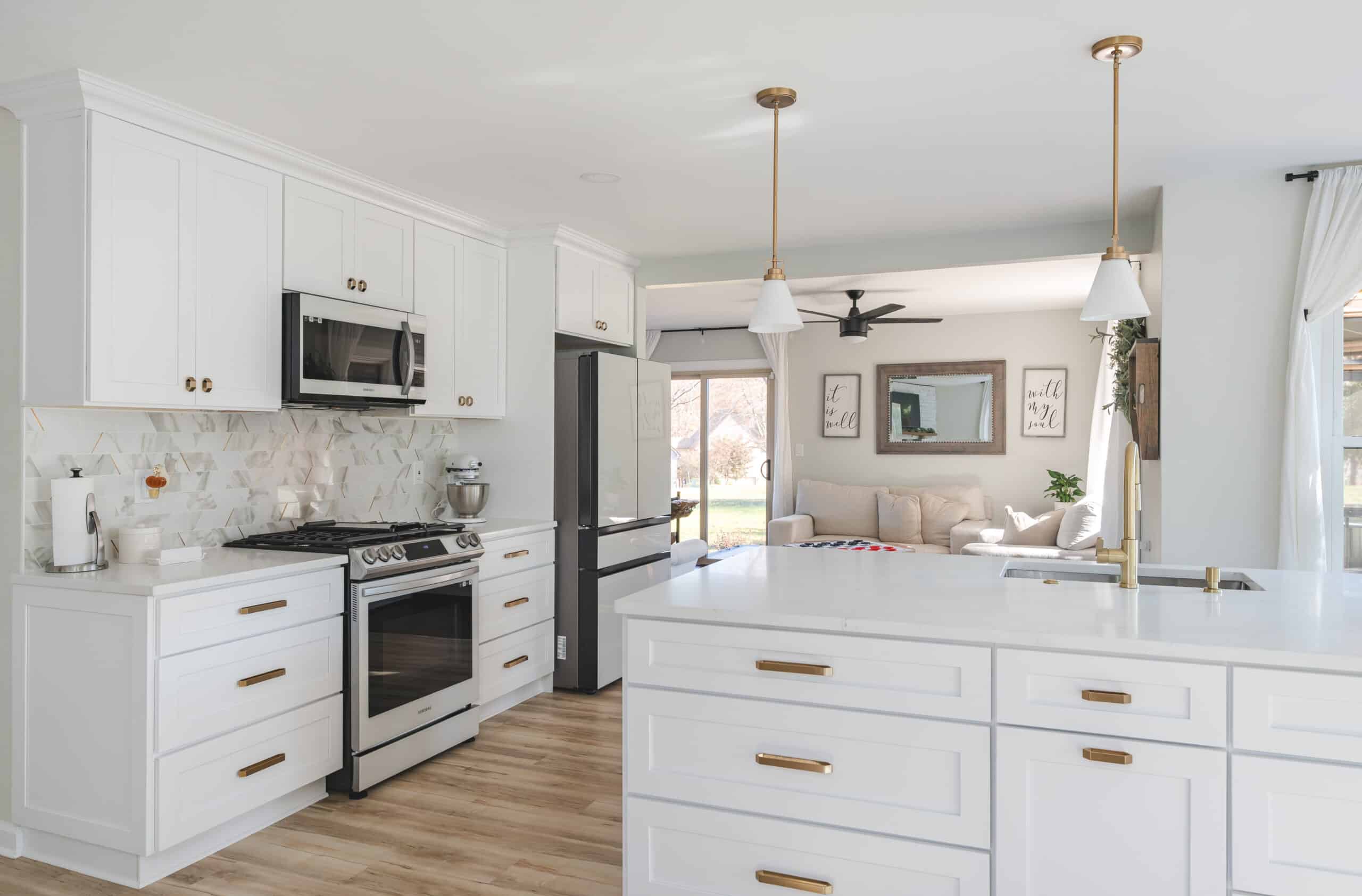 White kitchen and bathroom project in bumpass va with gold hardware