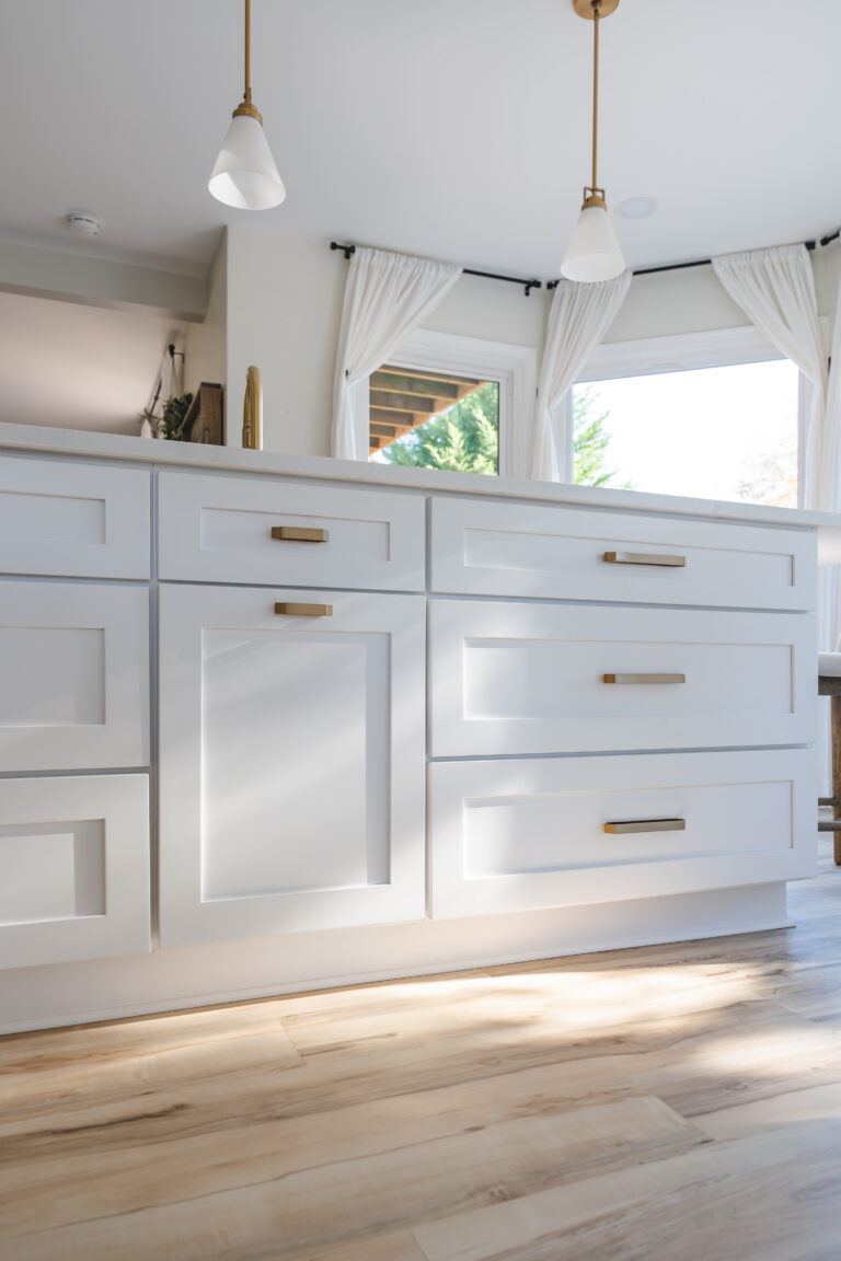 White kitchen in Bumpass VA with white shaker cabinet on island