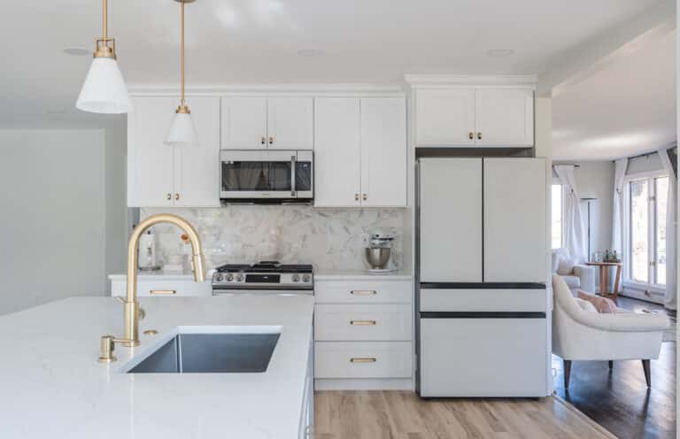 White kitchen in Bumpass VA with gold faucet