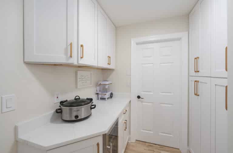 White kitchen in Bumpass VA with white cabinets and gold hardware