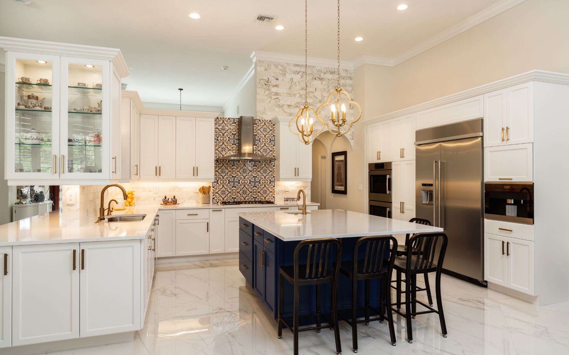 Modern, luxurious U-shape kitchen with white and navy shaker cabinets