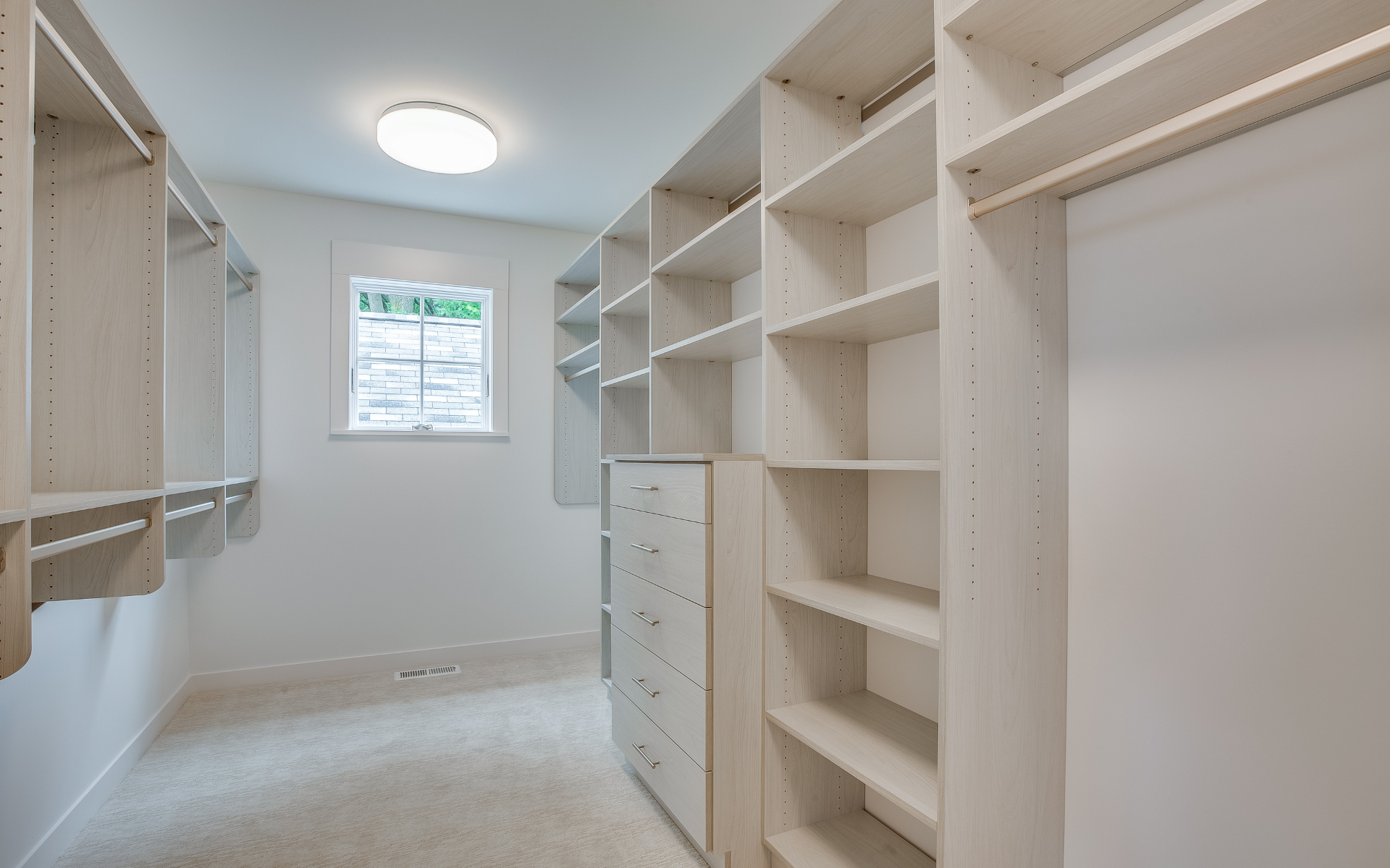 Small space closet with wall mounted shelving