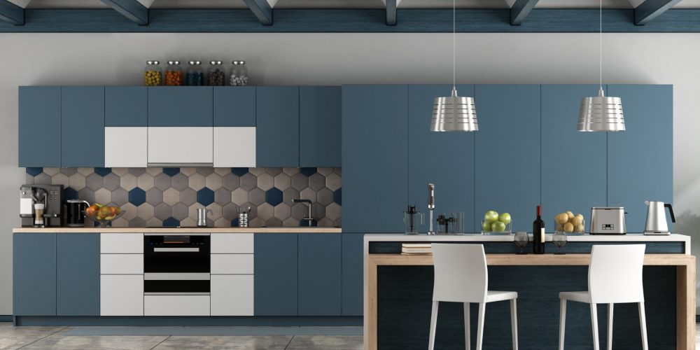 Blue kitchen cabinets with wood flooring