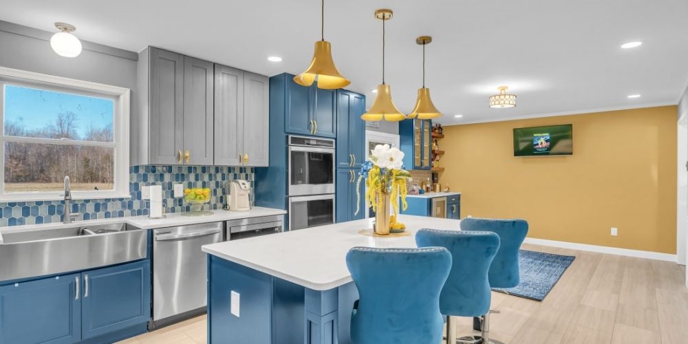 kitchen project in waldorf md with blue cabinets, white countertops, wood flooring. 5 Remodeling Ideas To Maximize Your Small Kitchen In Friendly MD
